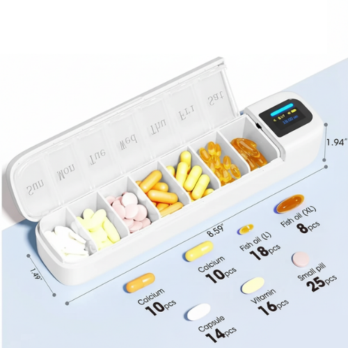 White pill organizer with compartments filled with various pills and a digital display on a light blue background.